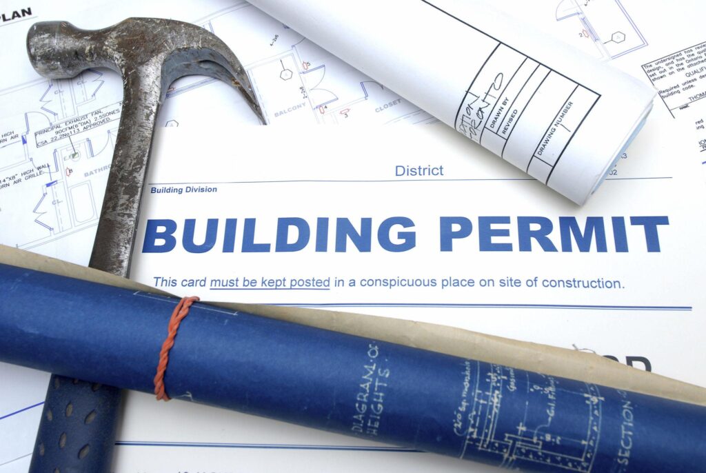 Development permit and building permit documents with construction plans in Calgary